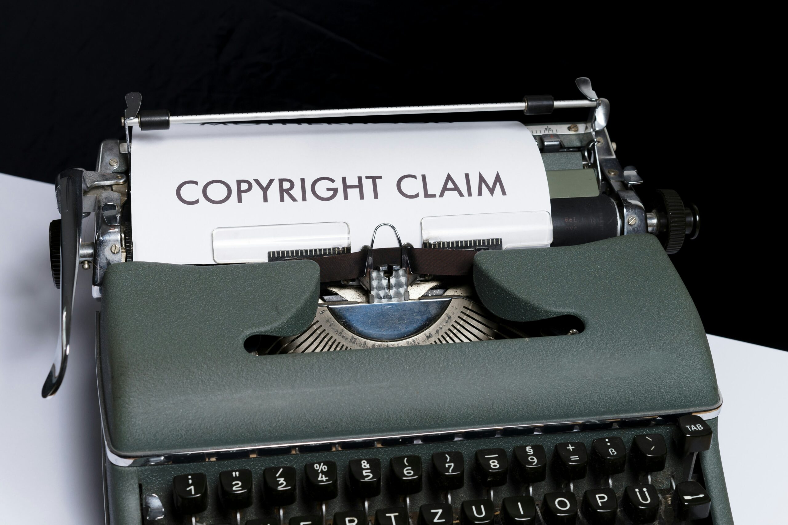 a typewriter with a document being written upon