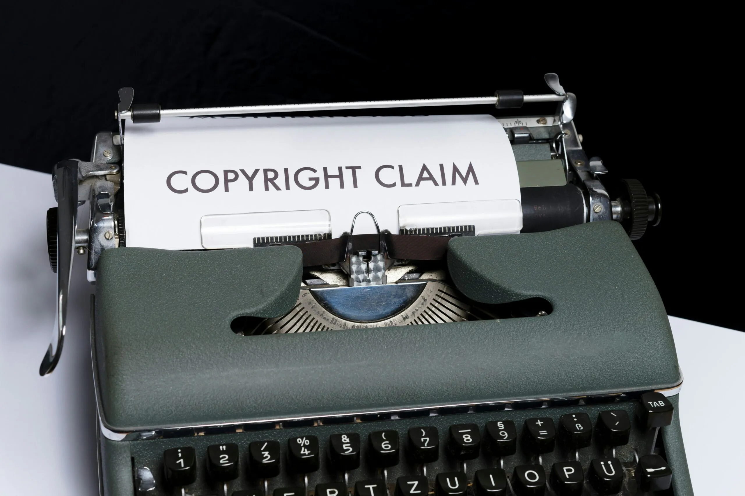a typewriter with a document being written upon